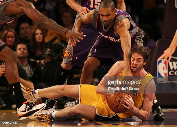 Pau Gasol of the Los Angeles Lakers grabs a loose ball against the Phoenix Suns in Game One of the Western Conference Finals during the 2010 NBA...