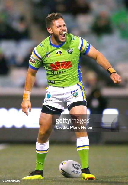 Aiden Sezer of the Raiders celebrates scoring a try during the round 18 NRL match between the Canberra Raiders and the North Queensland Cowboys at...
