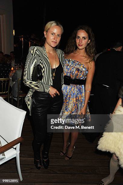 Olympia Scarry and guest attend Finch's Quarterly Cannes Dinner 2010 at the Hotel du Cap as part of the 63rd Cannes Film Festival on May 17, 2010 in...