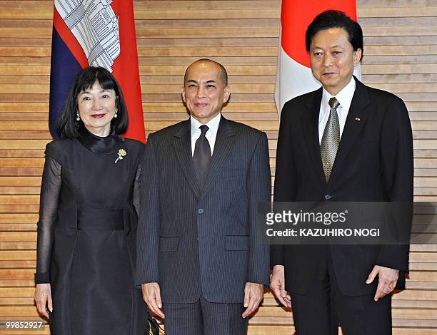 Visiting Cambodian King Norodom Sihamoni is welcomed by Japanese Prime Minister Yukio Hatoyama and his wife Miyuki prior to a luncheon at the prime...