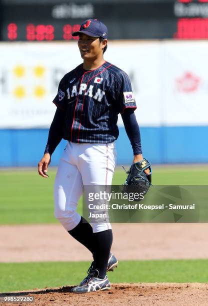 Water Matsumoto of Japan smiles in the forth inning during the Haarlem Baseball Week game between Chinese Taipei and Japan at the Pim Mulier...