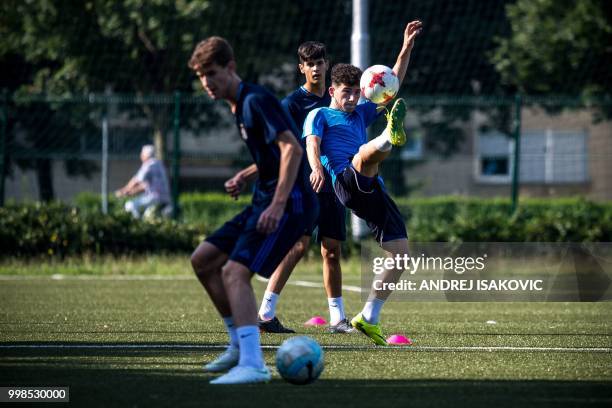 Young Dinamo Zagreb footbal club players take part in a training session in Zagreb, on July 14, 2018. - Whether it's the World Cup final match or...