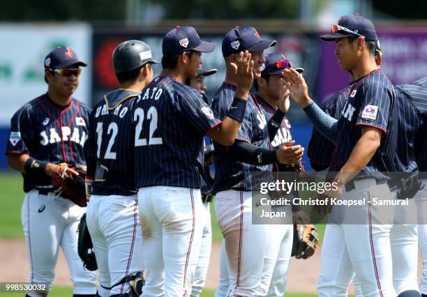 The team of Japan celebrates winning Haarlem Baseball Week game between Chinese Taipei and Japan at the Pim Mulier honkbalstadion on July 14, 2018 in...