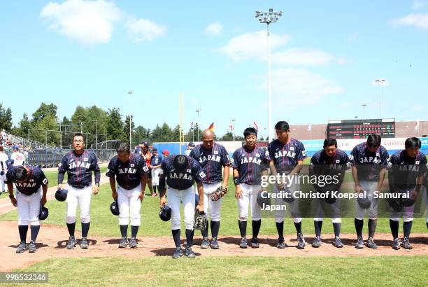 The team of Japan reacts after winning the Haarlem Baseball Week game between Chinese Taipei and Japan at the Pim Mulier honkbalstadion on July 14,...