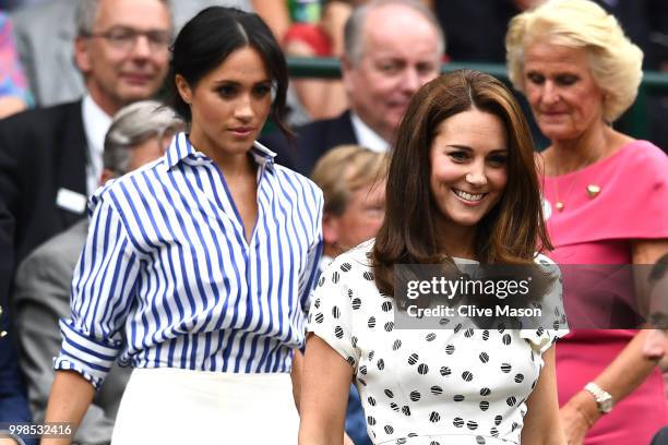 Meghan, Duchess of Sussex and Catherine, Duchess of Cambridge attend day twelve of the Wimbledon Lawn Tennis Championships at All England Lawn Tennis...