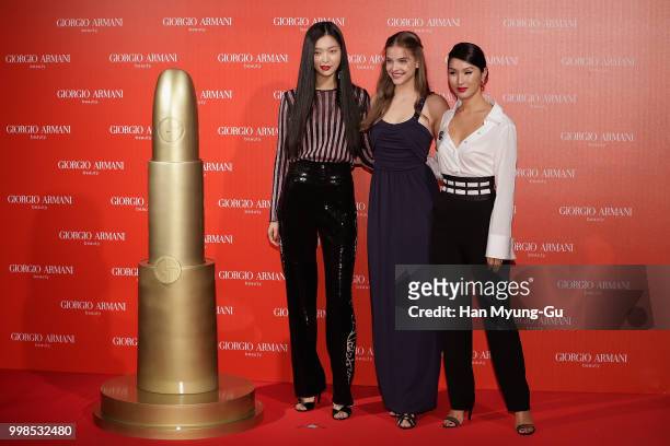 Models Kim Sung-Hee, Barbara Palvin and Nicole Warne attend during a promotional event for the 'GIORGIO ARMANI' Beauty on July 13, 2018 in Seoul,...