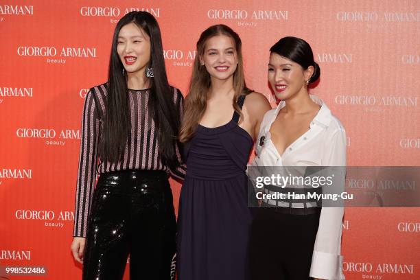 Models Kim Sung-Hee, Barbara Palvin and Nicole Warne attend during a promotional event for the 'GIORGIO ARMANI' Beauty on July 13, 2018 in Seoul,...