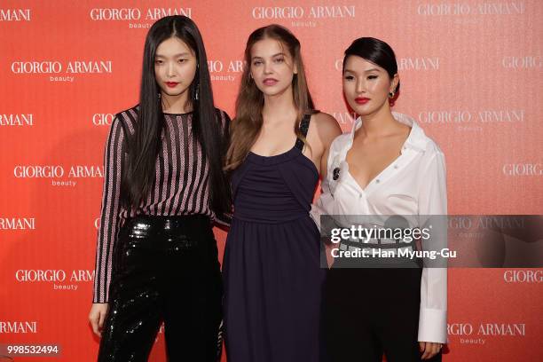 Models Kim Sung-Hee, Barbara Palvin and Nicole Warne attend during a promotional event for the 'GIORGIO ARMANI' Beauty on July 13, 2018 in Seoul,...