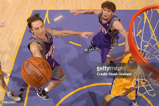 Steve Nash of the Phoenix Suns goes up for a shot against Kobe Bryant of the Los Angeles Lakers in Game One of the Western Conference Finals during...