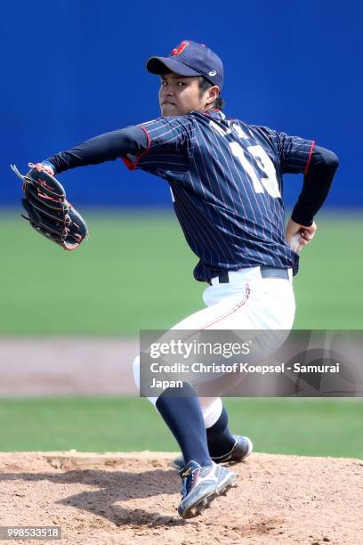Hiroshi Kaino of Japan pitches in the nineth inning during the Haarlem Baseball Week game between Chinese Taipei and Japan at the Pim Mulier...