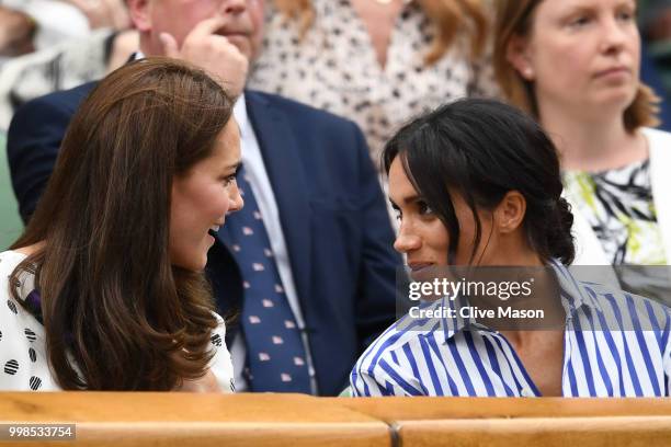 Catherine, Duchess of Cambridge and Meghan, Duchess of Sussex attend day twelve of the Wimbledon Lawn Tennis Championships at All England Lawn Tennis...