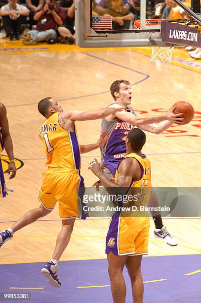 Goran Dragic of the Phoenix Suns goes up for a shot against Jordan Farmar of the Los Angeles Lakers in Game One of the Western Conference Finals...