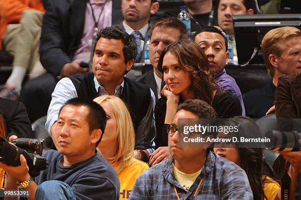 Producer Cash Warren and his wife, Actress Jessica Alba attend a game between the Phoenix Suns and the Los Angeles Lakers in Game One of the Western...