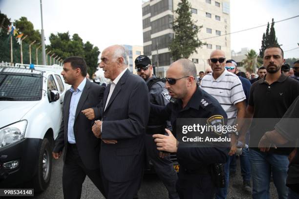 Palestinian businessman Munib al-Masri is detained by Israeli police upon his arrival to attend a symposium to evaluate the status of Islamic...