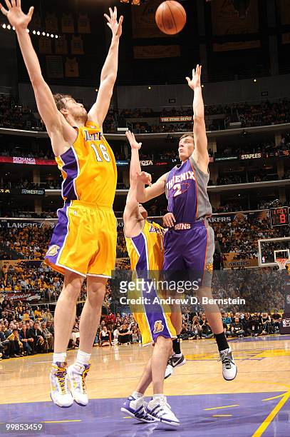 Goran Dragic of the Phoenix Suns puts up a shot against Pau Gasol of the Los Angeles Lakers in Game One of the Western Conference Finals during the...
