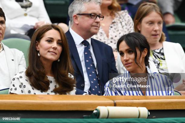 Catherine, Duchess of Cambridge and Meghan, Duchess of Sussex attend day twelve of the Wimbledon Lawn Tennis Championships at All England Lawn Tennis...