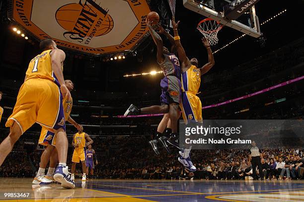 Jason Richardson of the Phoenix Suns goes up for a shot against Lamar Odom of the Los Angeles Lakers in Game One of the Western Conference Finals...