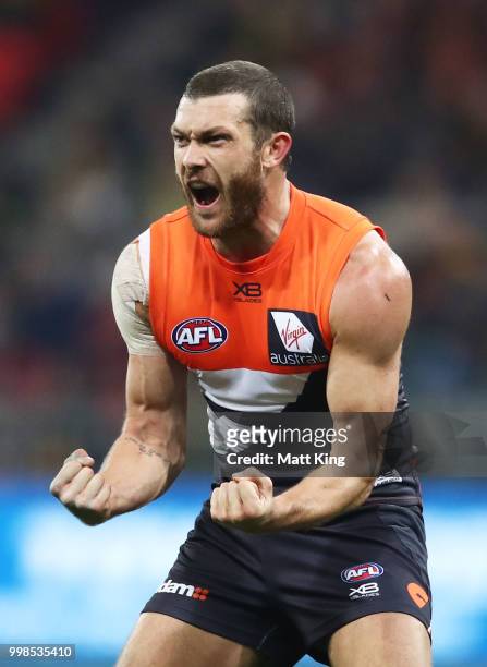 Sam Reid of the Giants celebrates victory at fulltime during the round 17 AFL match between the Greater Western Sydney Giants and the Richmond Tigers...