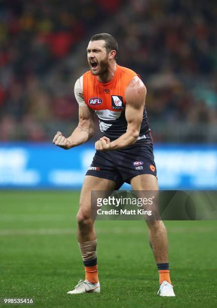 Sam Reid of the Giants celebrates victory at fulltime during the round 17 AFL match between the Greater Western Sydney Giants and the Richmond Tigers...
