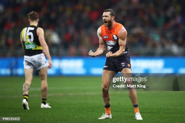 Sam Reid of the Giants celebrates victory at fulltime during the round 17 AFL match between the Greater Western Sydney Giants and the Richmond Tigers...