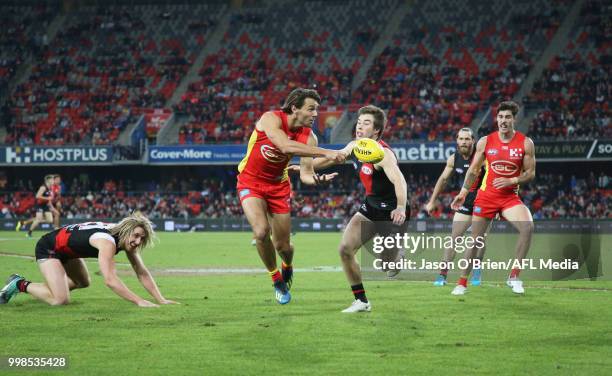 Lachie Weller of the Suns in action during the round 17 AFL match between the Gold Coast Suns and the Essendon Bombers at Metricon Stadium on July...