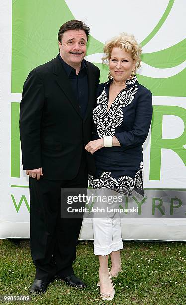 Nathan Lane and Bette Midler attend the 9th annual New York Restoration Project's Spring Picnic at Fort Washington Park on May 17, 2010 in New York...