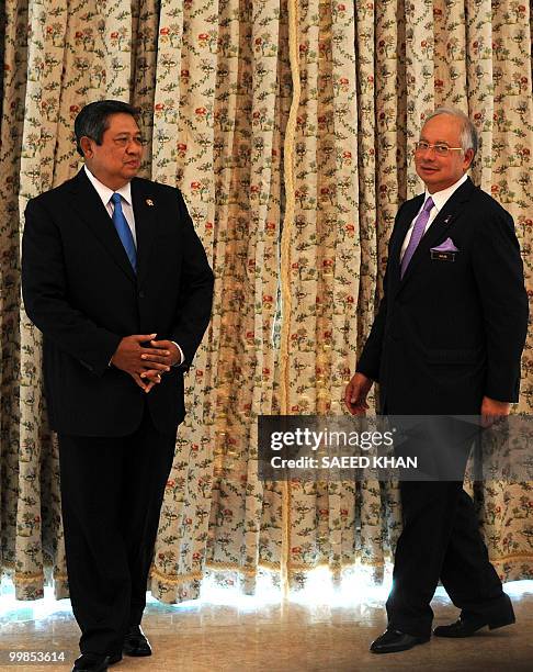 Malaysian Prime Minister Najib Razak and Indonesian President Susilo Bambang Yudhoyono arrive for a photocall prior to a memorendum signing ceremony...