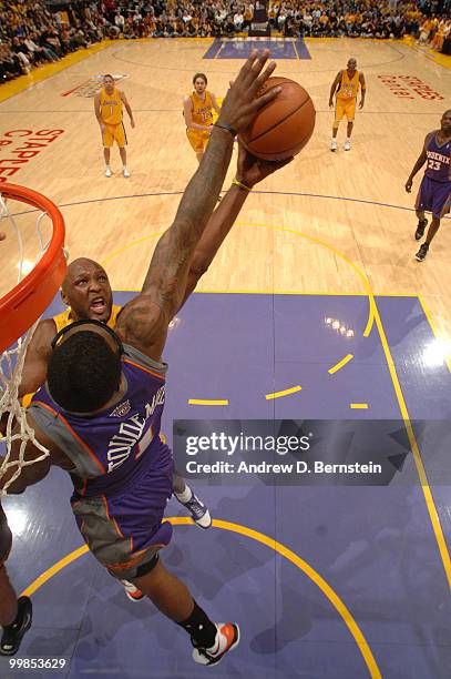 Lamar Odom of the Los Angeles Lakers has his shot blocked by Amar'e Stoudemire of the Phoenix Suns in Game One of the Western Conference Finals...
