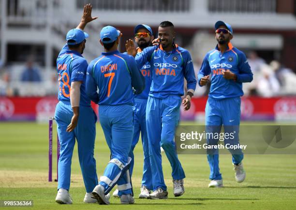 Hardik Pandya of India celebrates with teammates after dismissing Ben Stokes of England during the 2nd ODI Royal London One-Day match between England...