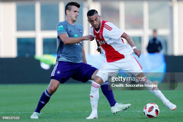 Antonio Milic of Anderlecht, Hakim Ziyech of Ajax during the Club Friendly match between Ajax v Anderlecht at the Olympisch Stadion on July 13, 2018...