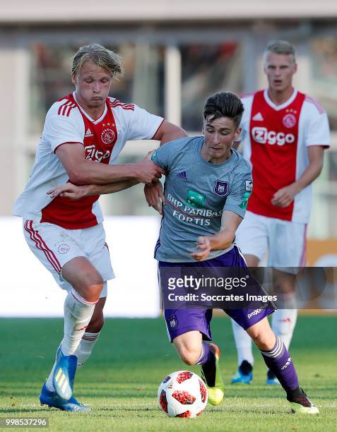 Kasper Dolberg of Ajax, Elias Cobbaut of Anderlecht during the Club Friendly match between Ajax v Anderlecht at the Olympisch Stadion on July 13,...