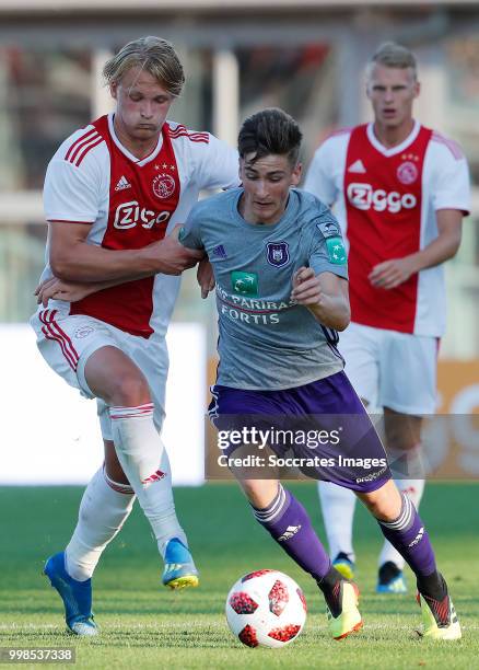 Kasper Dolberg of Ajax, Elias Cobbaut of Anderlecht during the Club Friendly match between Ajax v Anderlecht at the Olympisch Stadion on July 13,...