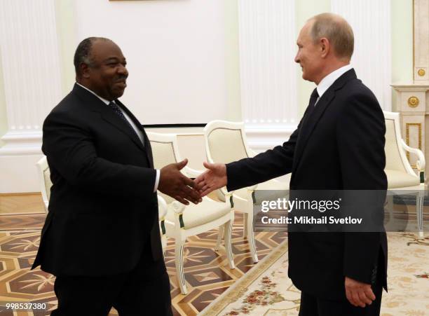 Russian President Vladimir Putin enters the hall during their meeting with President of Gabon Ali Bongo Ondimba at the Kremlin, in Moscow, Russia,...