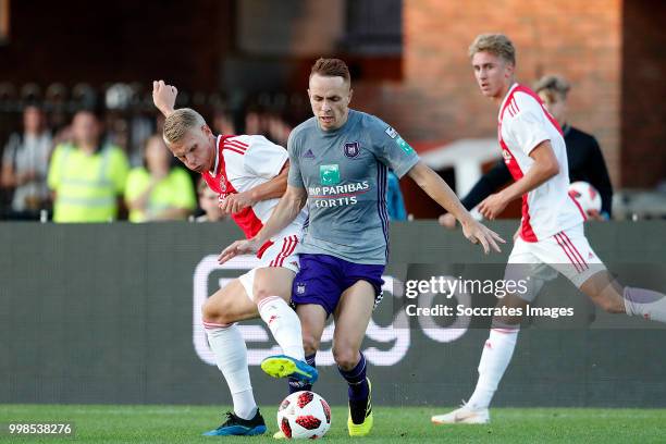 Mitchel Bakker of Ajax, Adrien Trebel of Anderlecht during the Club Friendly match between Ajax v Anderlecht at the Olympisch Stadion on July 13,...