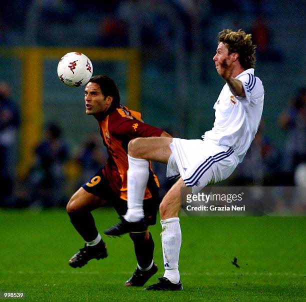 Vincenzo Montella and Steve McManaman in action during the Champions League match played at the Olympic stadium in Rome, Italy. Real Madrid won the...
