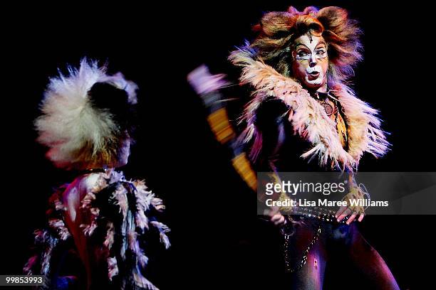 Performer John O'Hara plays the character Rum Tum Rugger on stage during a media preview for the musical CATS at the Lyric Theatre, Star City on May...