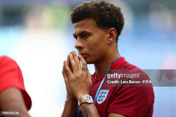 Dele Alli of England looks on during a pitch inspection prior to the 2018 FIFA World Cup Russia 3rd Place Playoff match between Belgium and England...