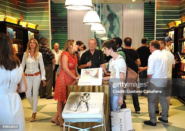 Guests attend the Taschen store Miami launch on May 17, 2010 in Miami Beach, Florida.