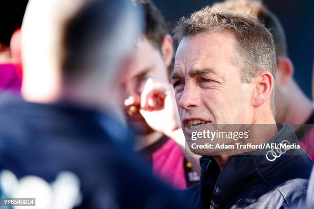 Alastair Clarkson, Senior Coach of the Hawks addresses his players during the 2018 AFL round 17 match between the Hawthorn Hawks and the Brisbane...