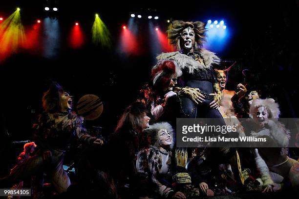 Performer John O'Hara plays the character Rum Tum Rugger alongside cast members on stage during a media preview for the musical CATS at the Lyric...