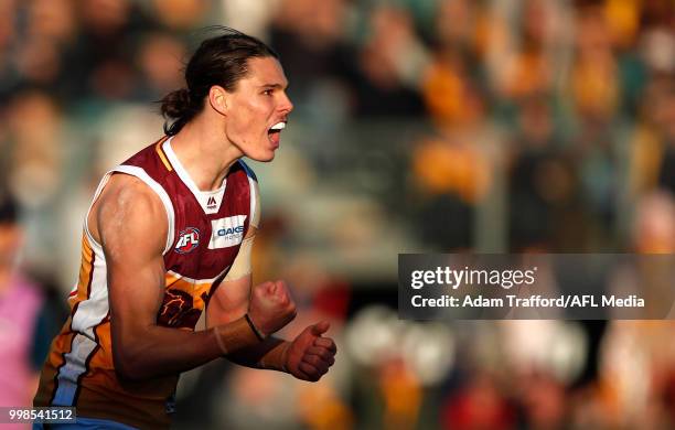 Eric Hipwood of the Lions celebrates a goal during the 2018 AFL round 17 match between the Hawthorn Hawks and the Brisbane Lions at UTAS Stadium on...