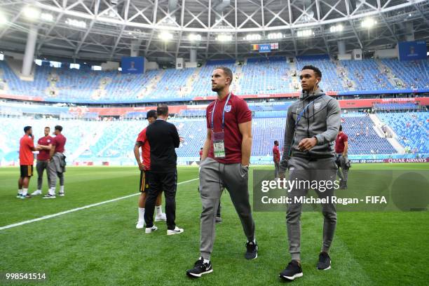 Jordan Henderson and Trent Alexander-Arnold of England walk across the pitch during a pitch inspection prior to the 2018 FIFA World Cup Russia 3rd...