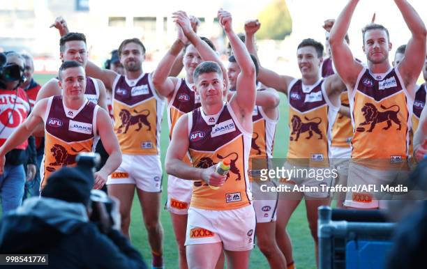 Dayne Zorko of the Lions thanks fans during the 2018 AFL round 17 match between the Hawthorn Hawks and the Brisbane Lions at UTAS Stadium on July 14,...