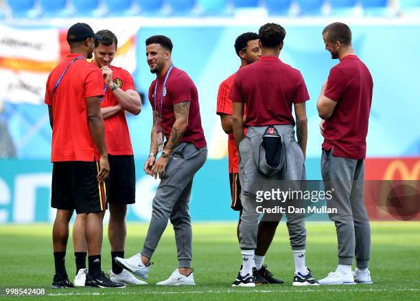 Vincent Kompany, Jan Vertonghen, and Kyle Walker of England speak during a pitch inspection prior to the 2018 FIFA World Cup Russia 3rd Place Playoff...