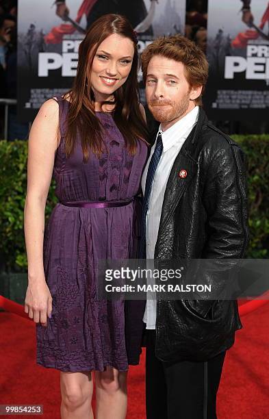 Actress Clare Grant and actor Seth Green pose on the red carpet as they arrive for the premiere of "Prince of Persia: The Sands of Time" at Grauman's...