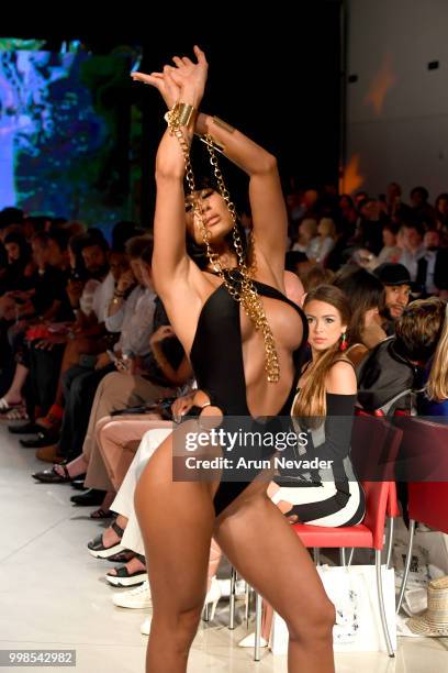 Model walks the runway for OMG Miami Swimwear at Miami Swim Week powered by Art Hearts Fashion Swim/Resort 2018/19 at Faena Forum on July 13, 2018 in...