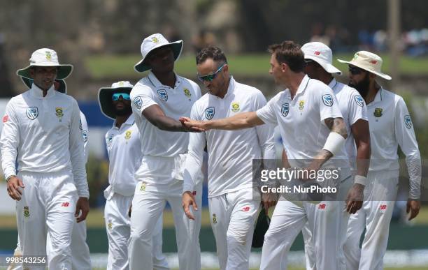 South African cricketers Kagiso Rabada,Dale Steyn, Faf du Plessis during the 3rd day's play in the first Test cricket match between Sri Lanka and...