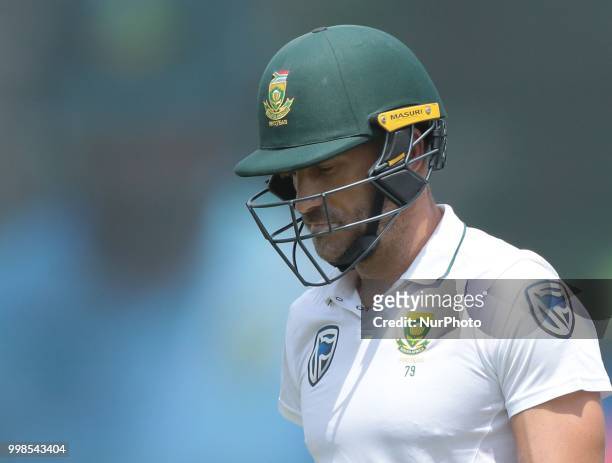 South African cricket captain Faf Du Plessis walks off after his dismissal during the 3rd day's play in the first Test cricket match between Sri...