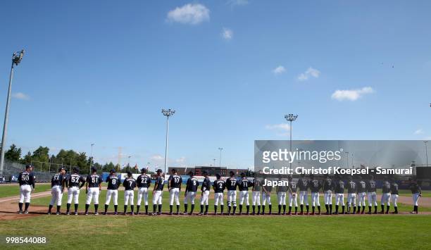 The team of Japan stands for the national anthem prior to the Haarlem Baseball Week game between Chinese Taipei and Japan at the Pim Mulier...