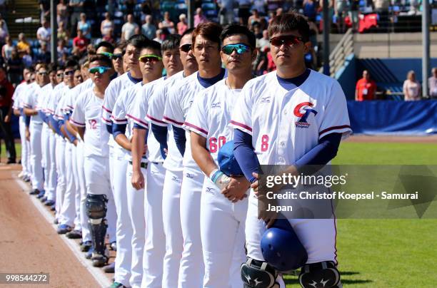 The team of of Chinese Taipei stands for the national anthem prior to the Haarlem Baseball Week game between Chinese Taipei and Japan at the Pim...